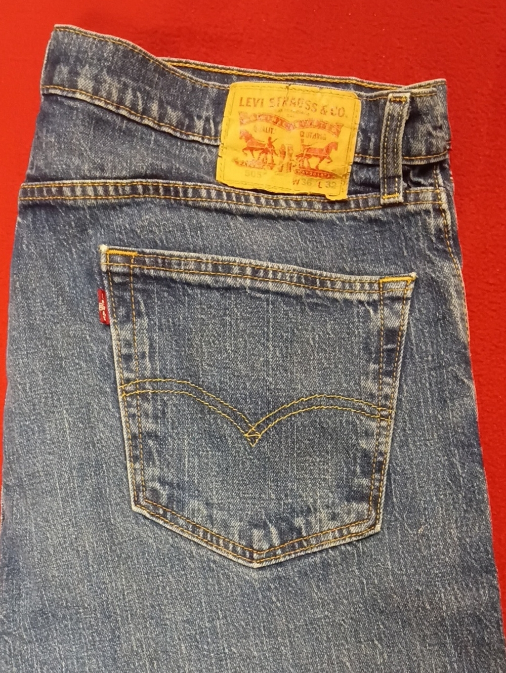 A292 Levi's Men’s Medium Blue Straight Jeans with Yellow Patch